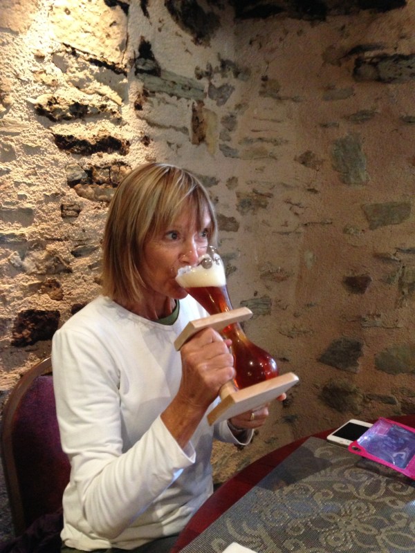 Bonnie with a beer -drinking aide.  I'm sure it made the brew taste so much better!