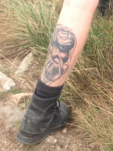 I dubbed this guy the "Headless Hiker" since he zoomed by me as I concentrated on the ground; his tattoo caught my eye and I quickly whipped out the camera and snapped the photo.