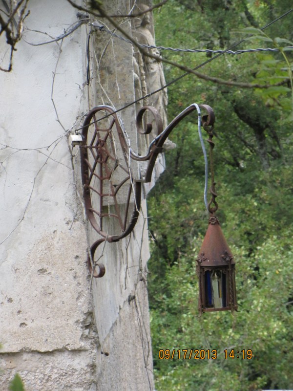 Adornments on a home we dubbed "the witch's lair" for the prominent spider-web theme